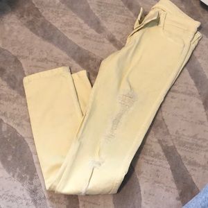 Yellow Alice and Olivia distressed skinny jeans